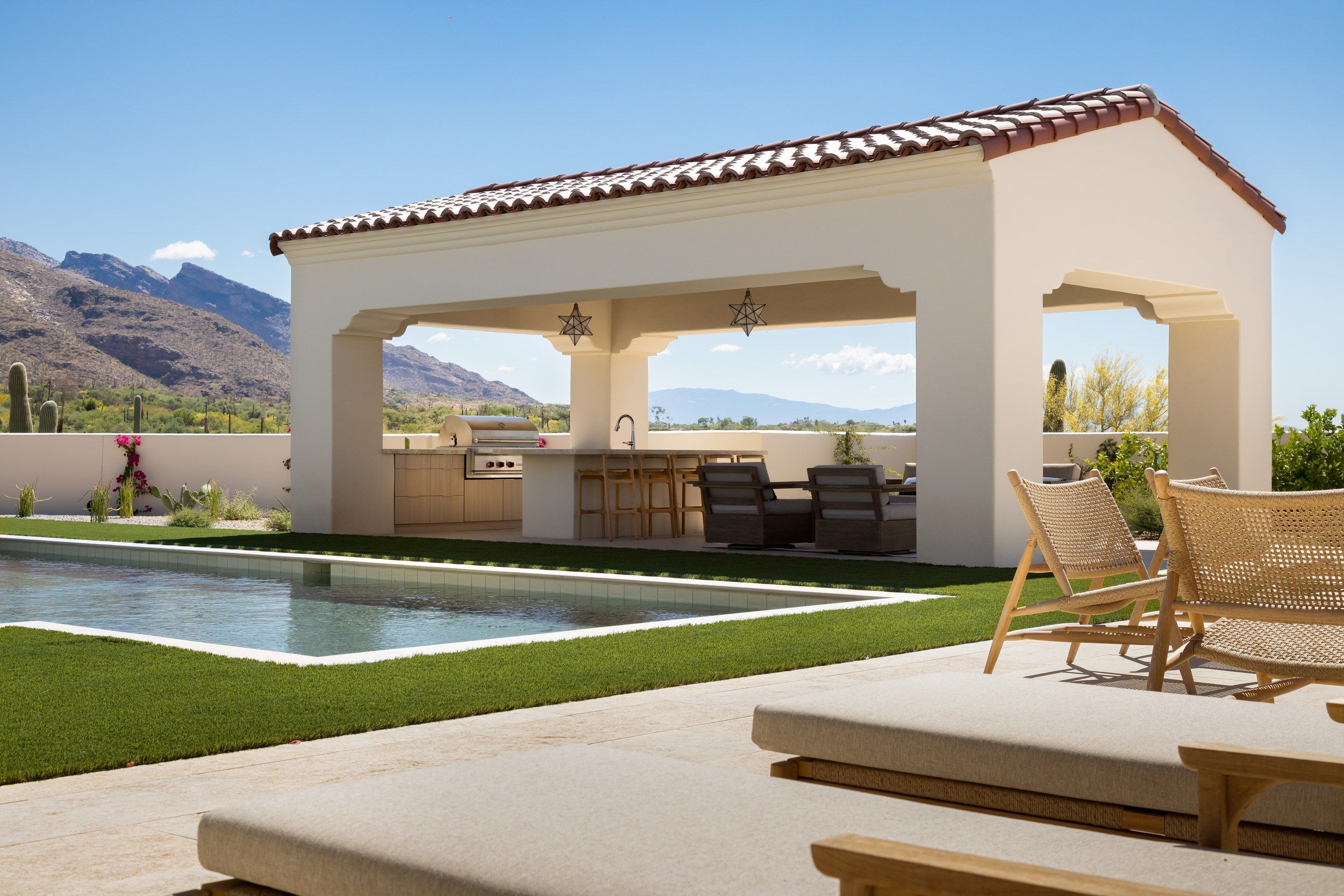 Ramada and lap pool with the Catalina Mountains beyond
